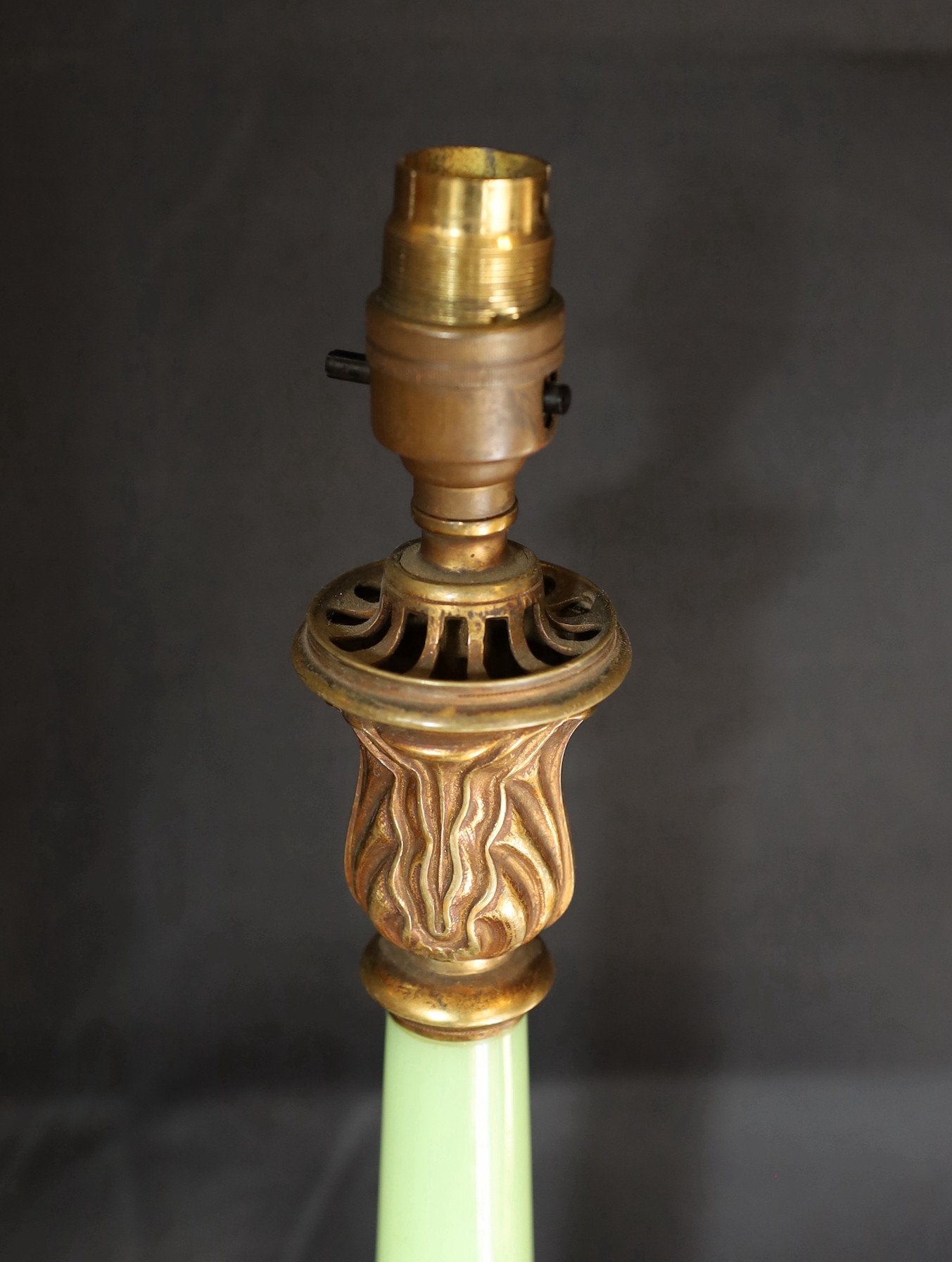 An early 20th century English ormolu mounted green opaque glass table lamp, height 46 cm